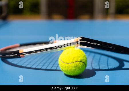 Broken tennis racket on clay tennis court Stock Photo