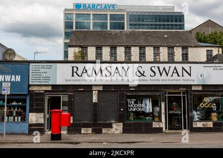 Shops beside the Barclays Bank Campus headquarters, formerly Buchanan Wharf, Nelson Street, Tradeston, Glasgow, Scotland, UK Stock Photo