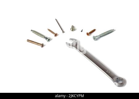 Wrong tool for this job. Wrench and different wrong fasteners on white background. Recruitment, HR human resources management in business company, put Stock Photo