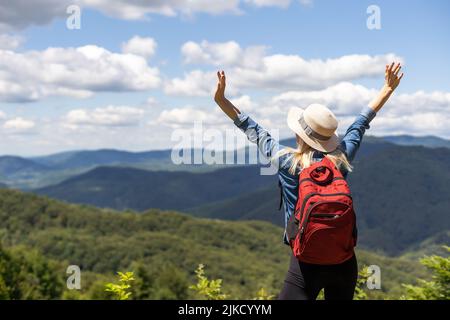 Girl Traveler hiking with backpack at rocky mountains landscape Travel  Lifestyle concept adventure summer vacations outdoor Stock Photo - Alamy