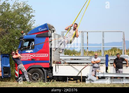 Zagreb, Croatia, August 1, 2022, The workers decided to use part of the break to swing on the ropes in Zagreb, Croatia on August 1, 2022. Photo: Zeljko Hladika/PIXSELL Stock Photo