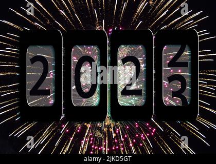 New year 2023 odometer sign on fireworks Stock Photo