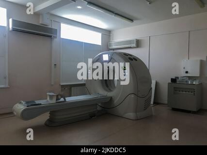 Moscow, Russia, April 2020: Hospital room with multi detector spiral CT Scanner - Computed Tomography. Medical technology concept and diagnostics of p Stock Photo