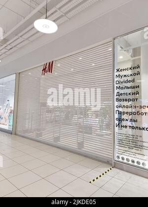 Moscow, Russia, March 2022: HM store suspends work in Russia. The shops are closed. Vertical image. Stock Photo