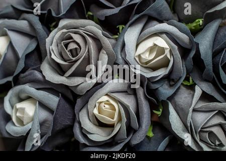back and white roses hand made from soap, abstract background Stock Photo