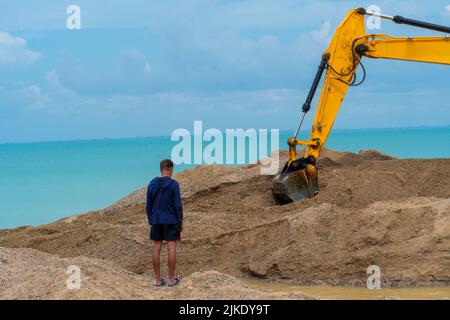 Sea aerial excavator dump truck quarry loading tractor machine machinery, for industry excavation from digger from site ground, dirt scoop. Nature Stock Photo