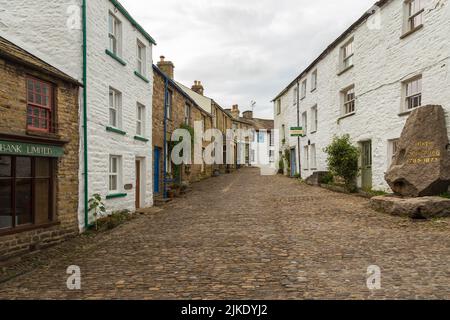 Dent, Cumbria, UK, 12 August 2018 - Facade of a stone building in the village of Dent in the Yorkshire Dales, UK Stock Photo