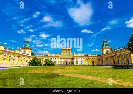 Ornate yellow exterior of Italian style 17th century baroque royal Wilanow Palace, Warsaw, Poland Stock Photo