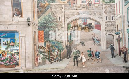 Teenage girl posing in front of a huge wall painting in Old Quebec City, Canada  - La Fresque des Québécois Stock Photo