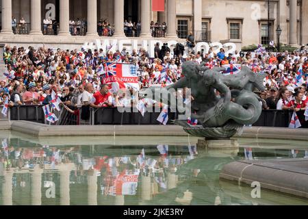 The day after the England Womens's Football team victory in the Euro 2022 tournament, in which they beat Germany 2-1 in extra time, reflected English fans celebrate in Trafalgar Square, on 1st August 2022, in London, England. The free event was staged by the English Football Association where the winning women players (aka The Lionesses) appeared on stage in front of an adoring public consisting of families, parents, children and especially aspiring young women footballers of the future. Stock Photo