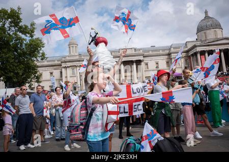 The day after the England Womens's Football team victory in the Euro 2022 tournament, in which they beat Germany 2-1 in extra time, English fans celebrate in Trafalgar Square, on 1st August 2022, in London, England. The free event was staged by the English Football Association where the winning women players (aka The Lionesses) appeared on stage in front of an adoring public consisting of families, parents, children and especially aspiring young women footballers of the future. Stock Photo