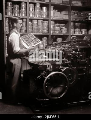 1930s MAN SMALL PRINTING PRESS OPERATOR STANDING BY MACHINE INSPECTING SHEET OF PRINTED PAPER CANS OF INK ON SHELVES BEHIND - i557 HAR001 HARS COPY SPACE HALF-LENGTH INK PERSONS CANS CARING MALES PROFESSION CRAFT VEST B&W SUCCESS SKILL OCCUPATION HAPPINESS SKILLS OPERATOR OWNER CUSTOMER SERVICE CAREERS CHOICE KNOWLEDGE LABOR PRIDE BY OF ON EMPLOYMENT OCCUPATIONS CONCEPTUAL IMAGINATION INSPECTING STYLISH INFRASTRUCTURE EMPLOYEE SHIRTSLEEVES TRADE CREATIVITY IDEAS MID-ADULT MID-ADULT MAN PRECISION BLACK AND WHITE CAUCASIAN ETHNICITY HAR001 LABORING OLD FASHIONED PRINTED Stock Photo