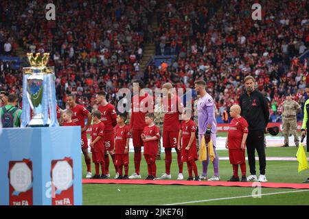 Leicester, UK. 30th July, 2022. Jurgen Klopp (Liverpool manager) with the Premier Leguee trophy on the left at the FA Community Shield match Liverpool v Manchester City, at King Power Stadium, Leicester, UK, on July 30, 2022 Credit: Paul Marriott/Alamy Live News Stock Photo