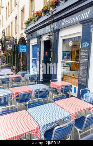 French restaurant in Grassmarket edinburgh with chequered tablecloths on outside tables,Edinburgh,Scotland,UK Stock Photo