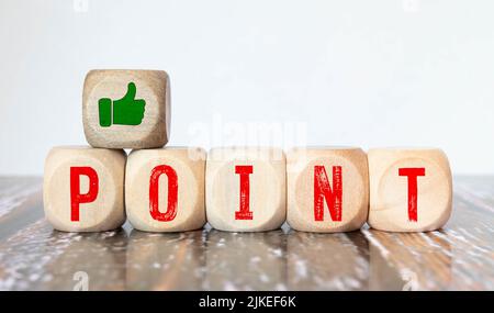 Point Five wooden blocks with POINT text of concept and a light bulb ...