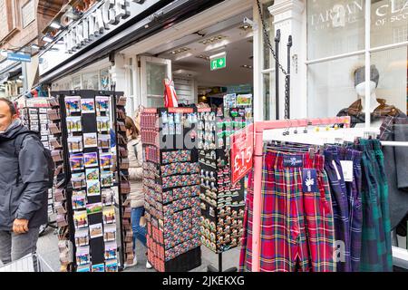 Edinburgh heritage gifts and souvenirs shop on Royal Mile, tartan kilts and fridge magnets stands outside the shop,Scotland,Uk summer 2022 Stock Photo