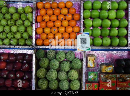 Mumbai, India. 01st Aug, 2022. A Unified Payment Interface (UPI) barcode is kept at a fruit stall for customers to make digital payment in Mumbai. Unified Payment Interface (UPI) recorded over 6,000,000,000 (six billion) transaction in the month of July in India which is the highest ever by a digital payment platform since it started in the year 2016. (Photo by Ashish Vaishnav/SOPA Images/Sipa USA) Credit: Sipa USA/Alamy Live News Stock Photo