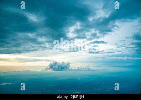 Aerial view of clouds from the sky. blue sky high view from airplane clouds. blue sky high view from airplane clouds Stock Photo