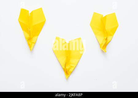 business failure yellow crumpled paper airplanes Stock Photo