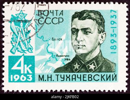 USSR - CIRCA 1963: A stamp printed in USSR shows Mikhail Nikolayevich Tukhachevsky (1893-1937), circa 1963. Stock Photo