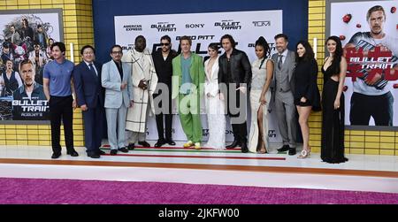 Los Angeles, United States. 02nd Aug, 2022. Cast members Logan Lerman, Masi Oka, Hiroyuki Sanada, Brian Tyree Henry, Bad Bunny, Brad Pitt, Joey King, Aaron Taylor-Johnson, Zazie Beetz, David Leitch, Kelly McCormick and Andrea Mu-oz (L-R) gather for a photo-op during the premiere of the motion picture thriller 'Bullet Train' at the Regency Village Theatre in the Westwood section of Los Angeles on Monday, August 1, 2022. Storyline: Five assassins aboard a fast moving bullet train find out their missions have something in common. Photo by Jim Ruymen/UPI Credit: UPI/Alamy Live News Stock Photo