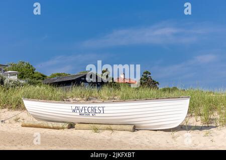 Old boat on the beach at the Wavecrest Resort in Montauk Stock Photo