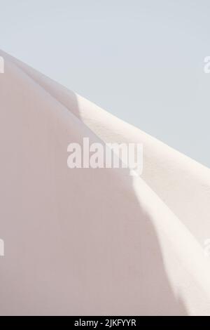 Detail of round shaped stairs of the entrance of a building. Minimal white. Stock Photo