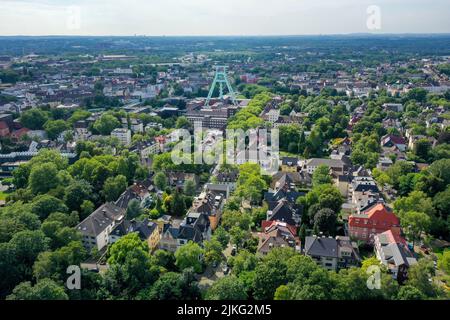 24.05.2022, Germany, North Rhine-Westphalia, Bochum - City view of Bochum with the colliery tower of the German Mining Museum in Bochum city center. I Stock Photo