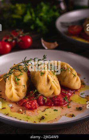 Traditional Italian dish culurgiones Stock Photo