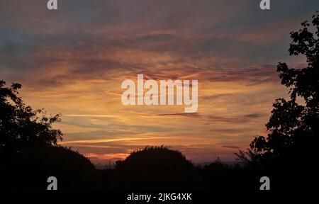 Sunrise over the Cheshire Plain from Coedpoeth, near Wrexham, Wales Stock Photo