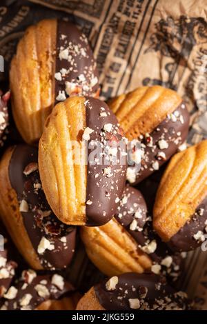 Madeleine cookies with dark chocolate Stock Photo
