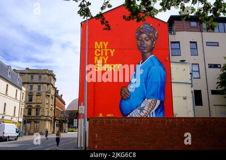 The My City, My Shirt mural in Butetown, Cardiff. Has been repainted in a new location after the previous site was painted over to accommodate a McDon Stock Photo