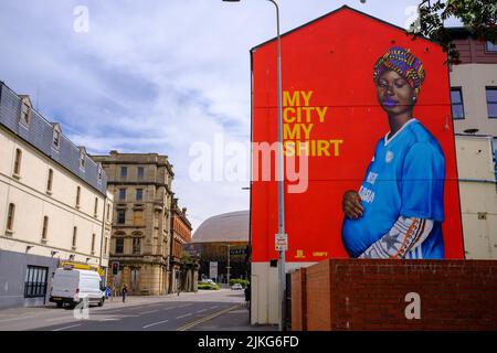 The My City, My Shirt mural in Butetown, Cardiff. Has been repainted in a new location after the previous site was painted over to accommodate a McDon Stock Photo