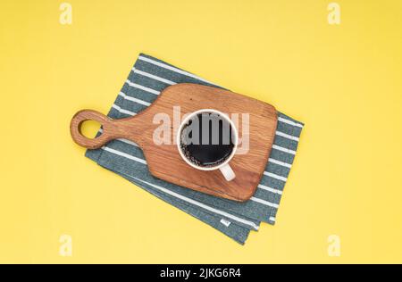 Filter coffee on wood standing and coffee beans. Isolated background Stock Photo
