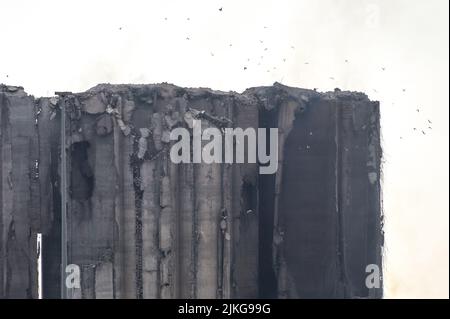 Beirut, Lebanon, 31 July 2022. After fermenting grain caught fire and burned for over two weeks inside grain silos damaged two years ago in the 4 August 2020 Beirut Port blast, two silos from the north block of the structure collapsed. Stock Photo