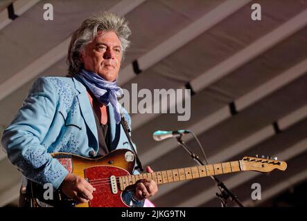 Marty Stuart performs with his Fabulous Superlatives band during a Lakefest Fourth of July Celebration concert on Saturday, July 3, 2010 in Jamestown, Russell County, KY, USA. Stuart's first new studio album since 2008, recorded at RCA's Studio B in Nashville and titled Ghost Train: The Studio B Sessions, is scheduled to be released next month. (Apex MediaWire Photo by Billy Suratt) Stock Photo