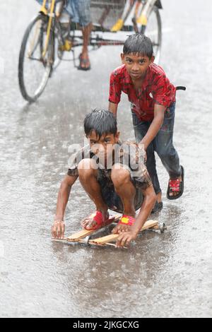 Dhaka, Bangladesh - August 02, 2022: People walk through the Mugda para ...