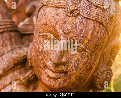 Head shot of the Hindu goddess Sarasvati. An ornately sculpted statue of goddess Saraswati, the goddess of knowledge, music, art, wisdom, and nature. Stock Photo