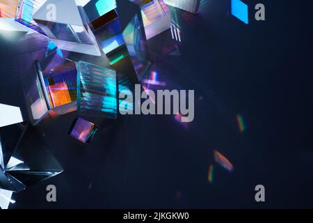 Geometric figures prisms with light diffraction of spectrum colors and reflection with trendy light Stock Photo