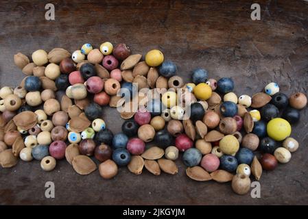 A closeup of old wooden beads with apricot pits Stock Photo