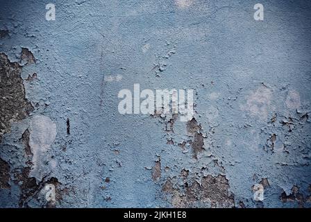 A background of a blue grungy textured concrete wall Stock Photo