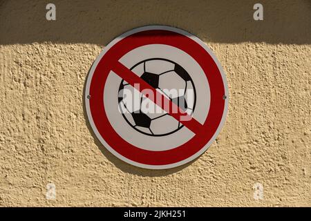 A beautiful shto of a no ball zone sign on a wall Stock Photo