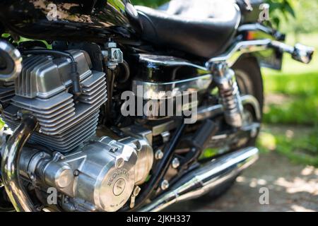 A closeup shot of details on an old vintage motorcycle at a farm in Ontario Stock Photo