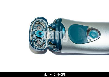 The old electric shaver on white background. Stock Photo