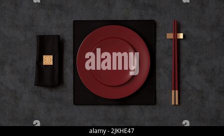 A top view of dark Asian tableware on a gray table Stock Photo