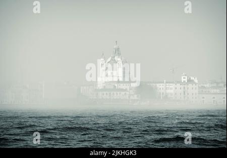 Foggy view at the church 'Santa Maria della Salute' in Venice Stock Photo