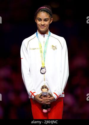 England's Ondine Achampong with the silver medal after finishing 2nd in the Women's Floor Exercise Final at Arena Birmingham on day five of the 2022 Commonwealth Games in Birmingham. Picture date: Tuesday August 2, 2022. Stock Photo