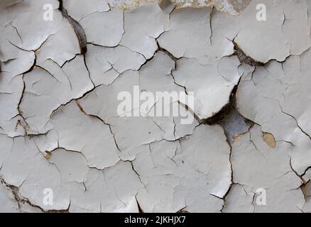 a closeup with a wall with peeling paint Stock Photo