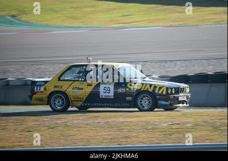 Barcelona, Spain; December 20, 2021: BMW E30 Racing car in the track of Montmelo Stock Photo