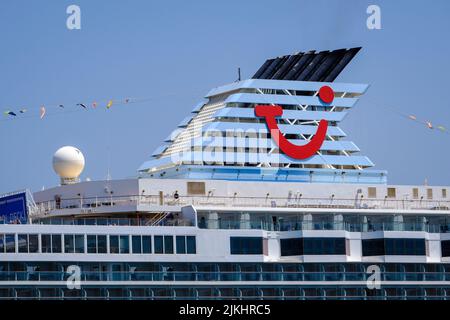 Corfu Town, Corfu, Greece - TUI cruise ship Marella Explorer is moored in the port of Corfu. The 262 meter long ship has a mass of 9, 900 tons. Stock Photo